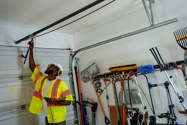 Professional Garage Door Installation technician working in East Highland Park, VA